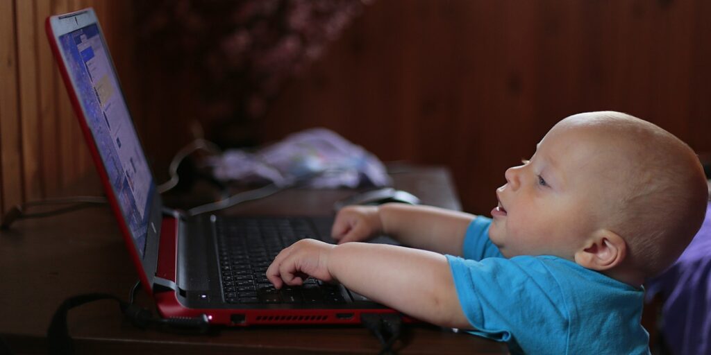 baby using a laptop