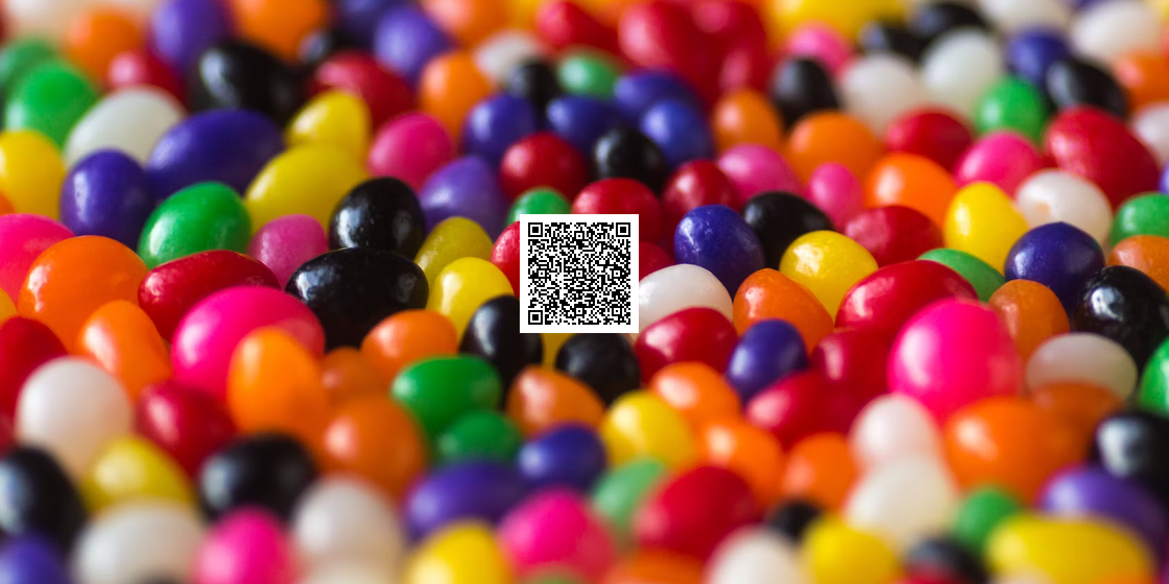 multicoloured jellybeans overlaid by a qr code