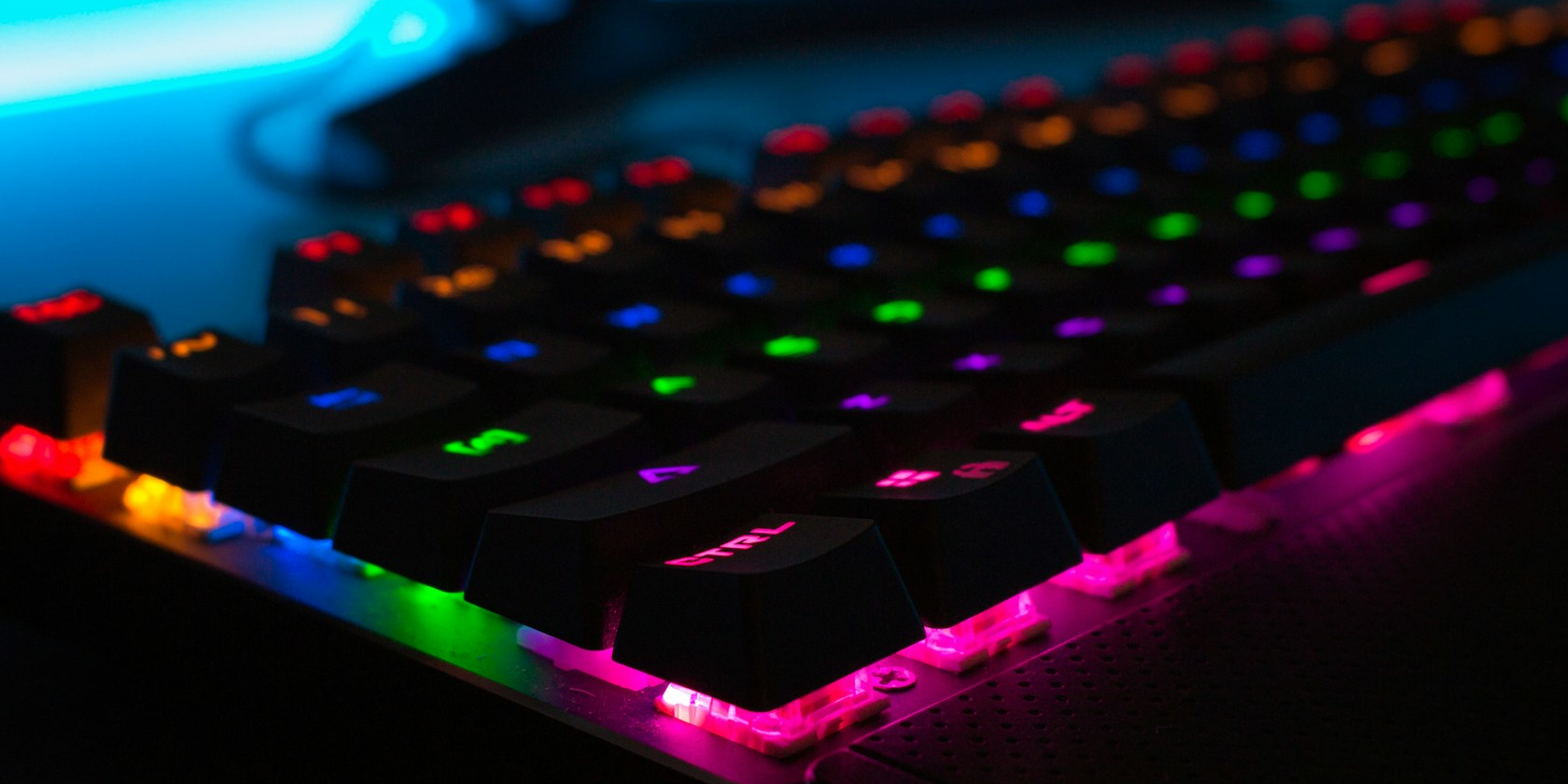 close-up of multi-coloured brightly lit keyboard